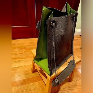 Gray bag with brilliant green accents and silver chain to gray and green handles